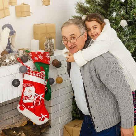 Grandad and granddaughter at Christmas
