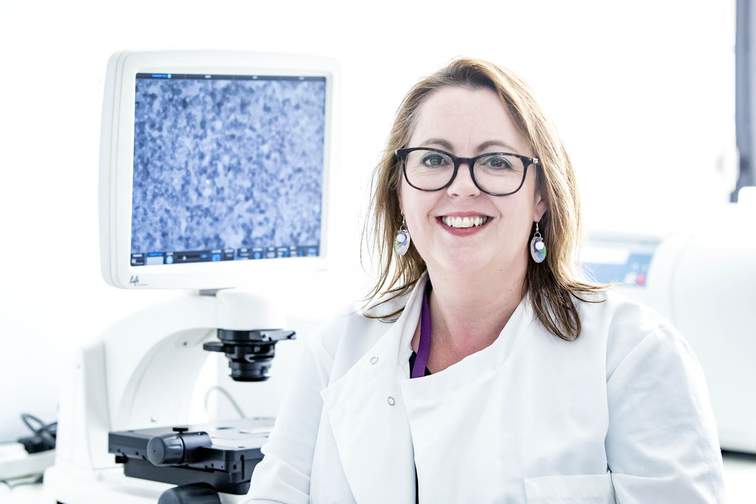 Amanda Carr in lab coat