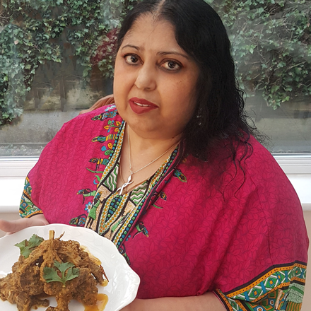 Kim Jaye with a plate of masala chops