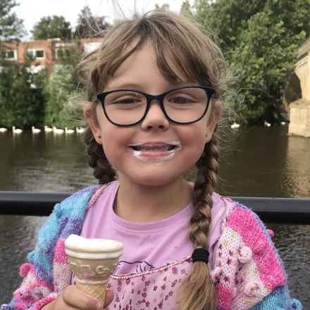 Matilda smiling eating ice-cream 