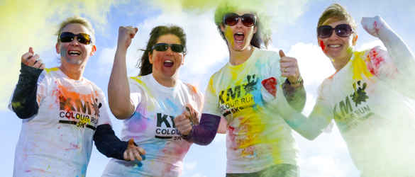 Colour run, four women covered in colourful powders