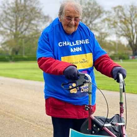 Ann Johnson with walker and Challenge t-shirt 