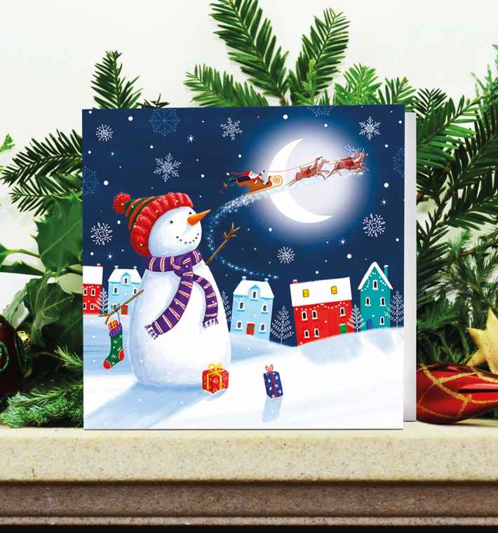 Christmas Eve Snowman on decorated mantle