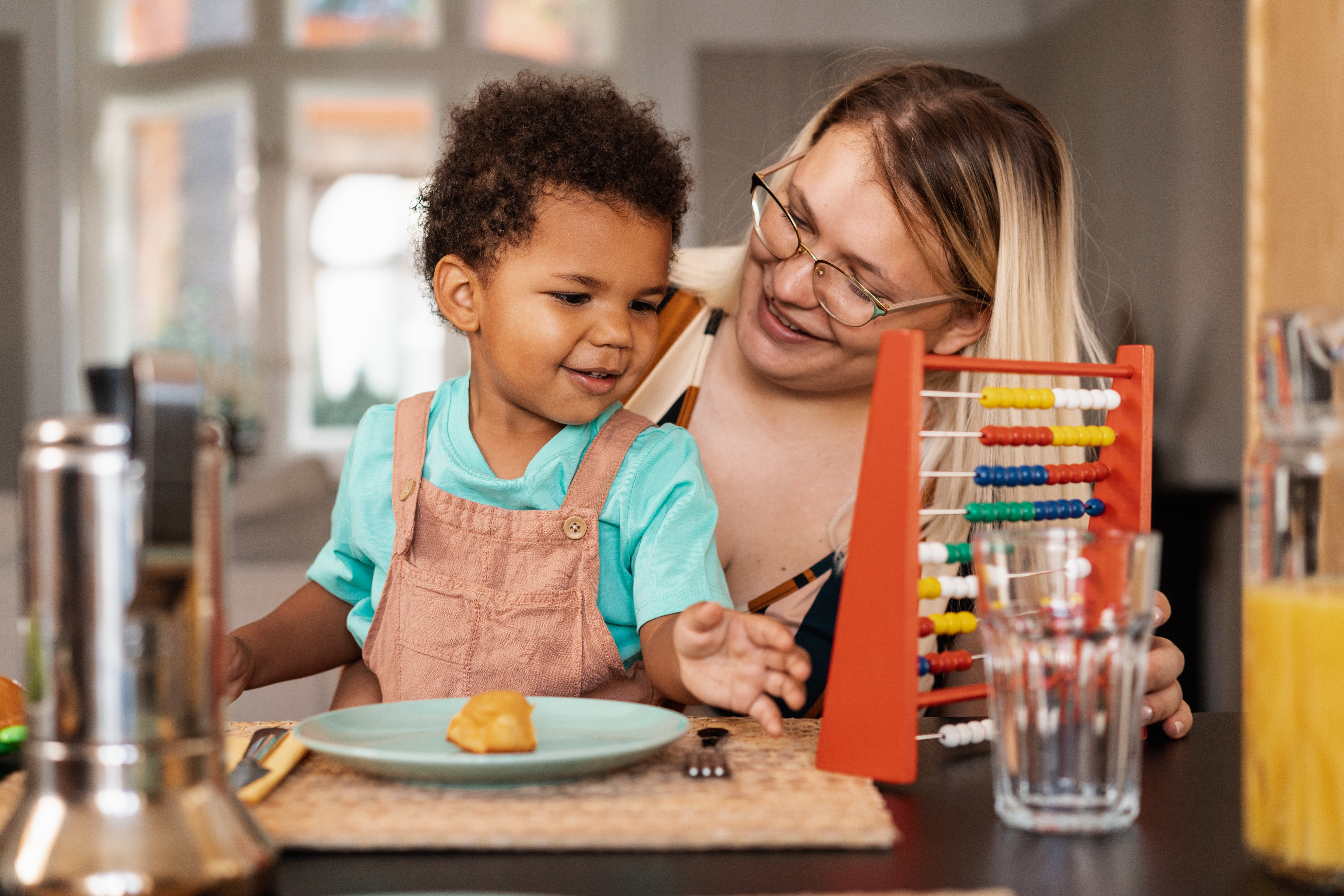 Mother and son playing and smiling